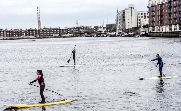 Stand up paddle boarding, Grand Canal Dock Dublin, Ireland
